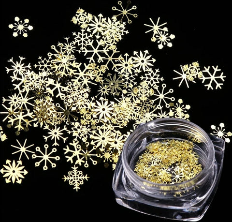 Nailart Schneeflocken in gold Miniformen