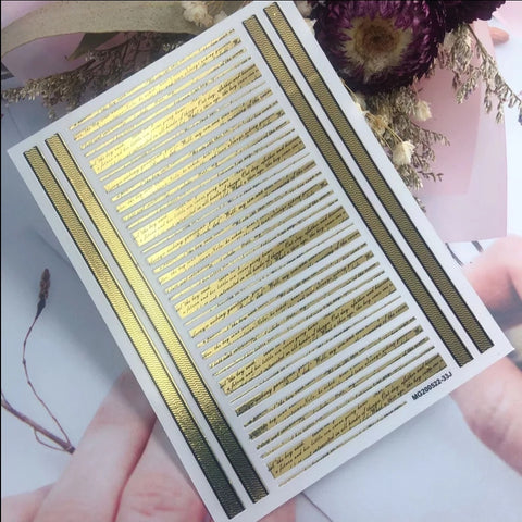 Sticker Linien mit Text in schwarz-gold MG-01